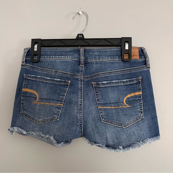 Distressed Medium Wash American Eagle Jean Shorts - Picture 4 of 5